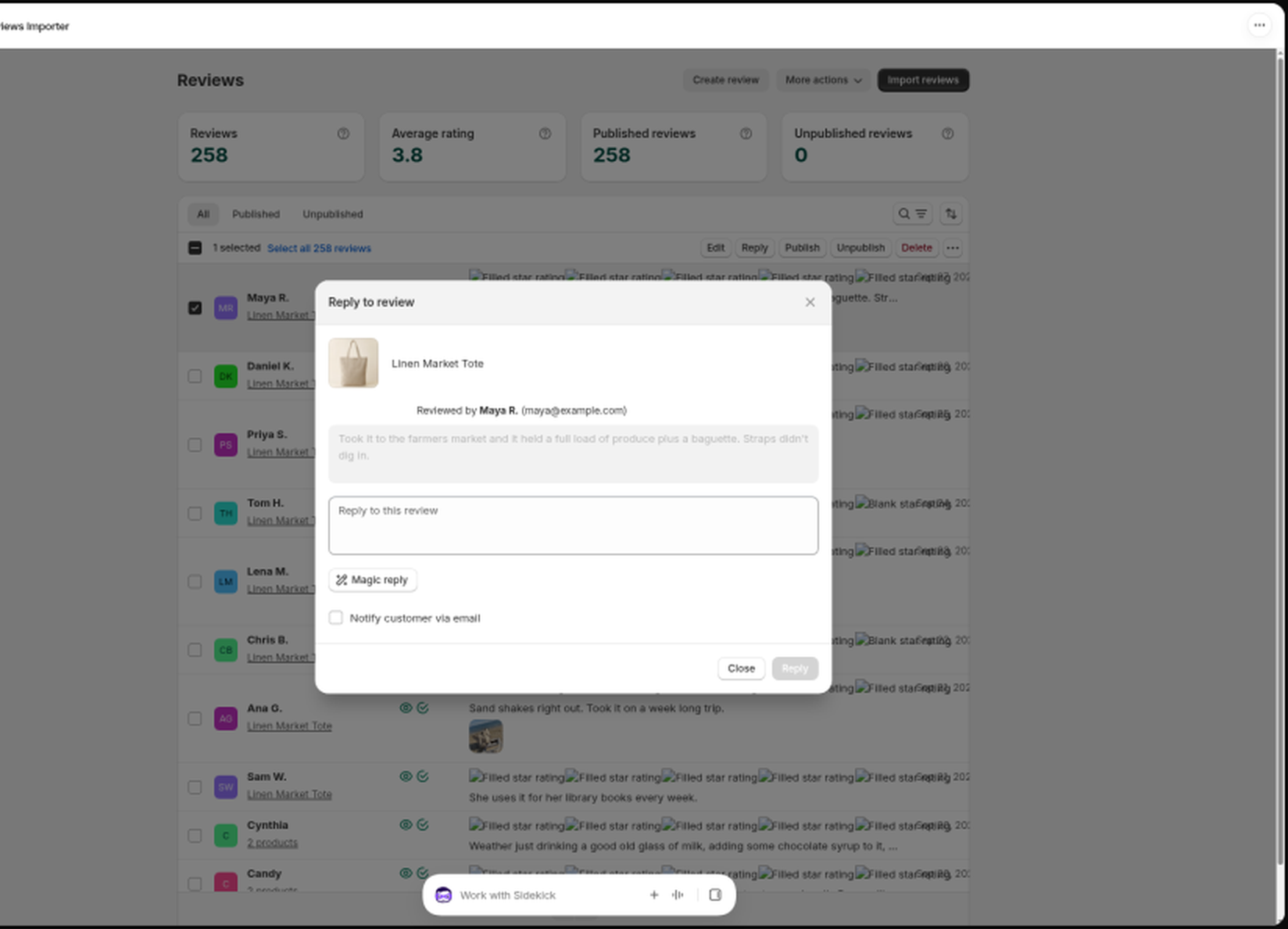 The Reply to review modal with the Magic reply button under the reply box